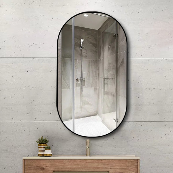 18 in. W x 36 in. H Oval Stainless Steel Framed Wall Bathroom Vanity Mirror in Matte Black/Brushed Gold
