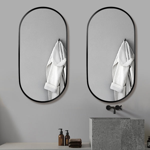 18 in. W x 36 in. H Oval Stainless Steel Framed Wall Bathroom Vanity Mirror in Matte Black/Brushed Gold