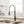 Stainless Steel Single Handle Pull Down Sprayer Kitchen Faucet with Water Supply Hoses in Matte Black with Brushed Gold