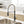 Stainless Steel Single Handle Pull Down Sprayer Kitchen Faucet with Water Supply Hoses in Matte Black with Brushed Gold