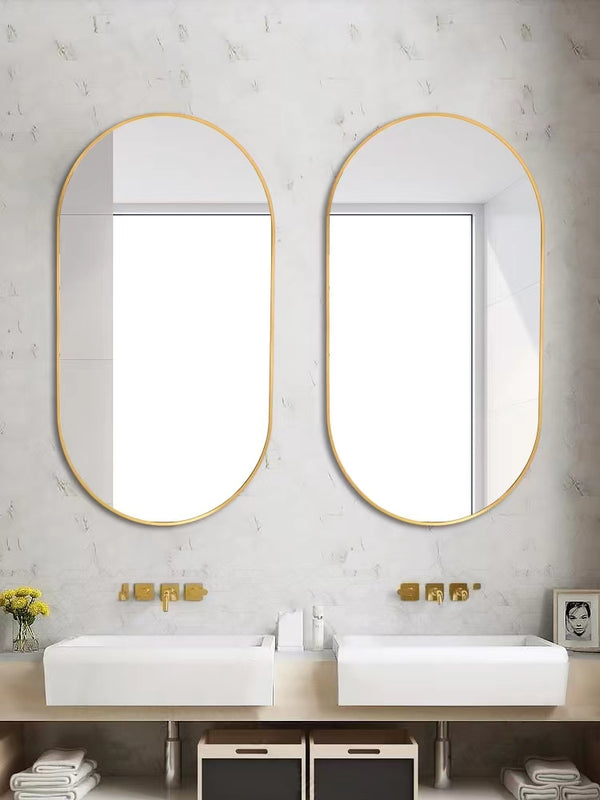 18 in. W x 36 in. H Oval Stainless Steel Framed Wall Bathroom Vanity Mirror in Matte Black/Brushed Gold